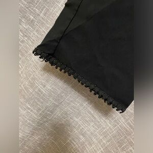 Black pant with embellished hem